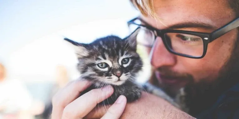 man with kitten