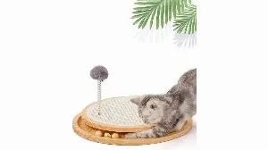 A cat is playing with a scratching toy on a wooden board.